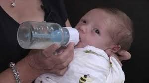 my baby refuses to breastfeed but will take a bottle; what do I do?